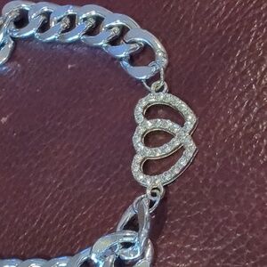 Bracelet. Chain link with hearts. Silvertone with glimmer hearts.